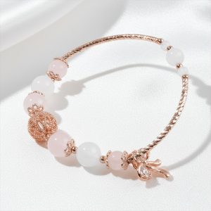 Vòng tay nữ đá tự nhiên mix charm bi cầu vàng hồng