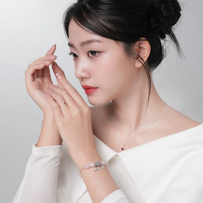 Vòng tay đá An Gem hồng mix trắng full charm - Ảnh 7