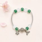 Vòng Dâu xanh mix mã não trắng charm vàng bạc
