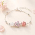 Vòng tay nữ Spring Kiss mix đá tự nhiên kèm charm hoa đào màu hồng tinh tế An Gem